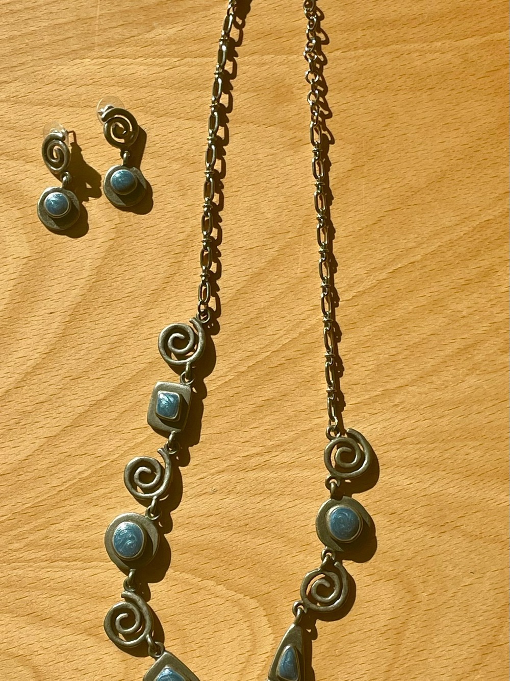 Handcrafted Silver-Tone Swirl Necklace & Earrings Set with Blue Accents